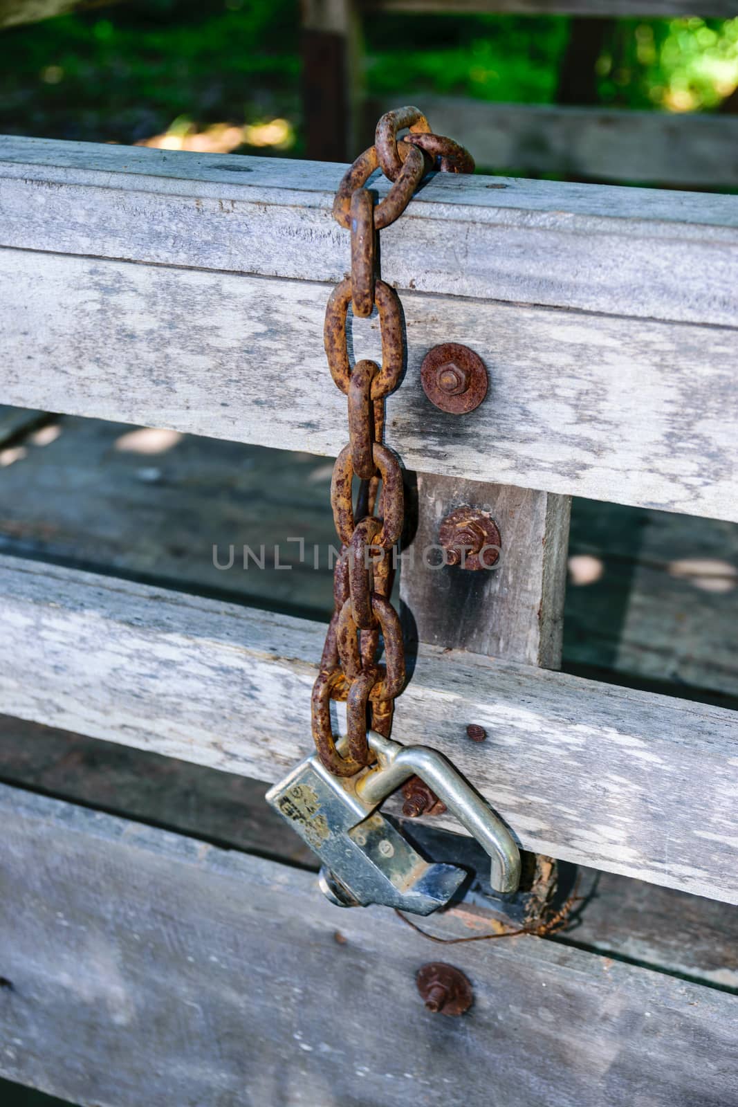 Old rusty padlock and chain.