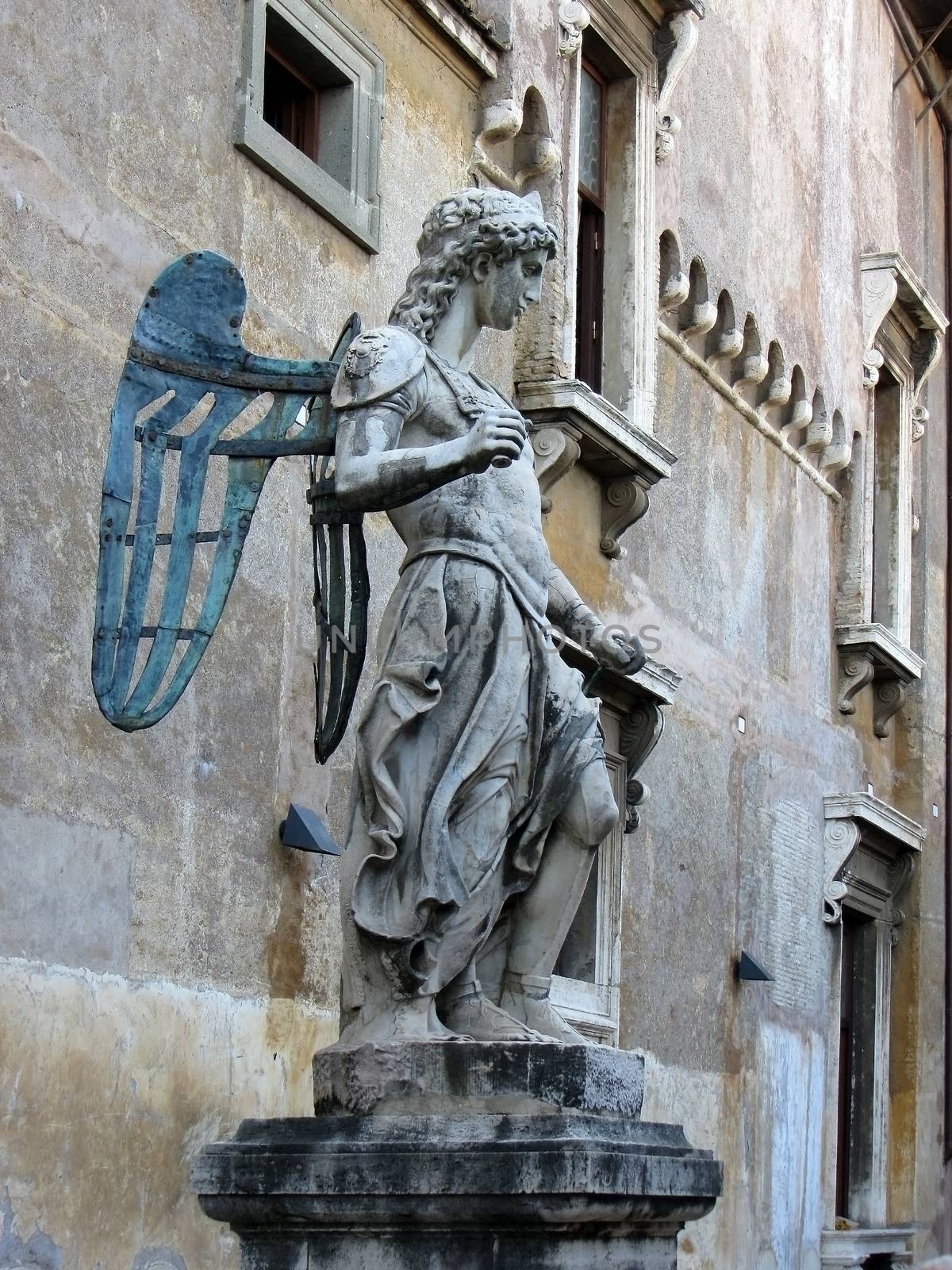 The statue of St. Michael the Archangel in Castel Sant'Angelo, Rome, Italy. by LanaLeta