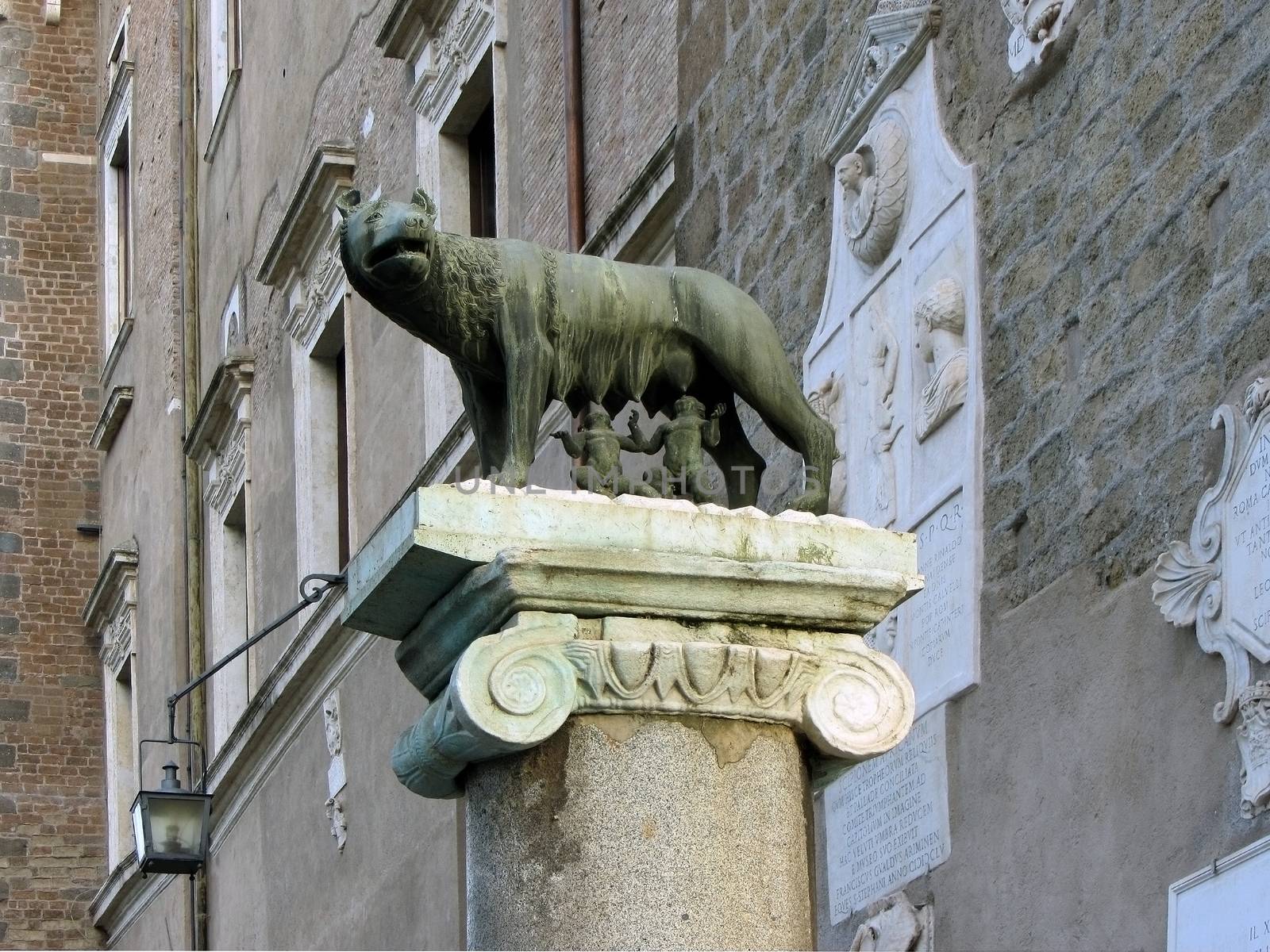 Sculpture of a mother-wolf feeding Romulus and Remus, Rome, Italy by LanaLeta
