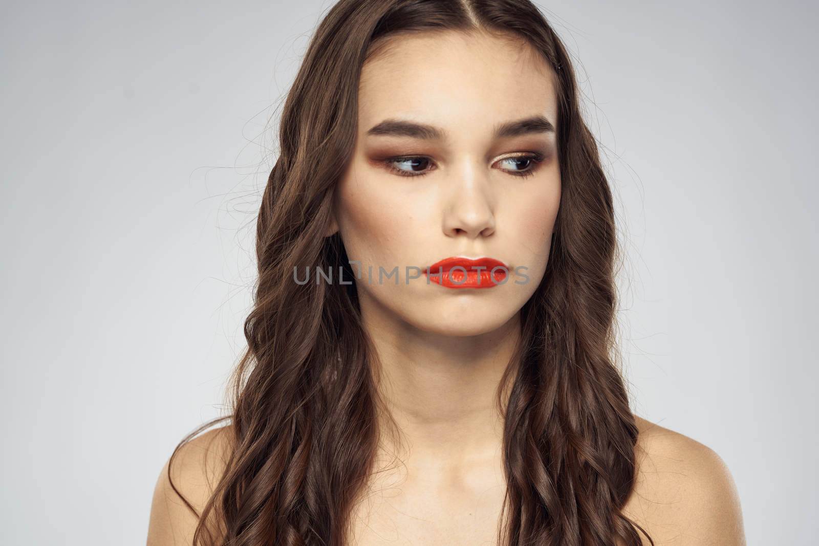 Beautiful woman fashionable hairstyle grooming naked shoulders bright makeup by SHOTPRIME