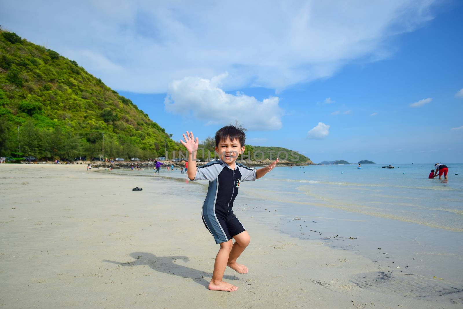 Rayong,Thailand,May5th,2014:The boys are happy and fun to see the ocean for the first time.