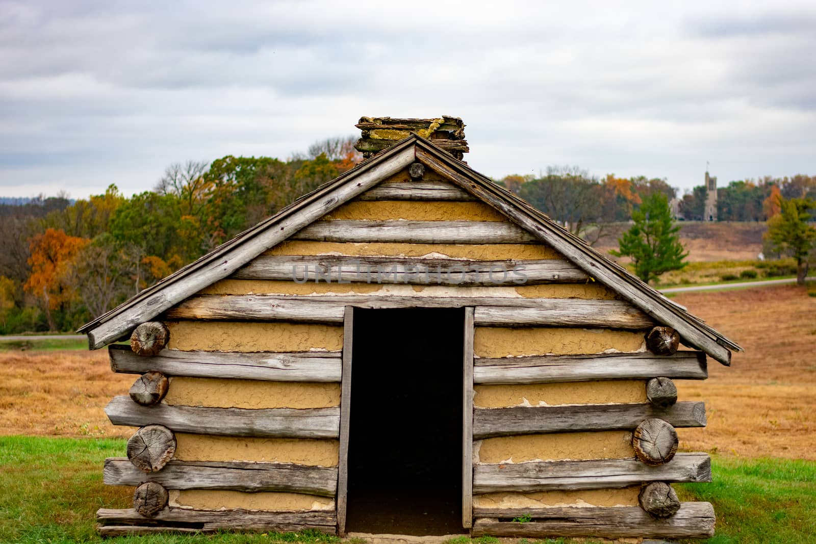 A Reconstructed Hut in a Wide Open Field in Valley Forge Nationa by bju12290