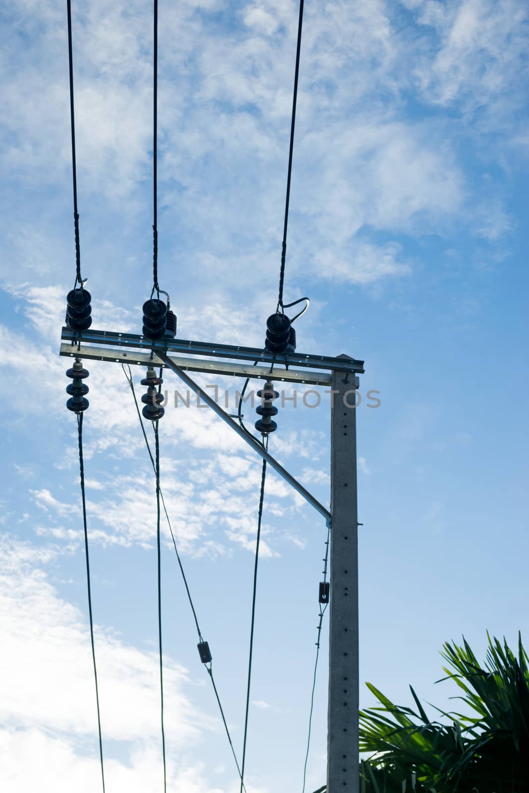 electricity post on blue sky background.