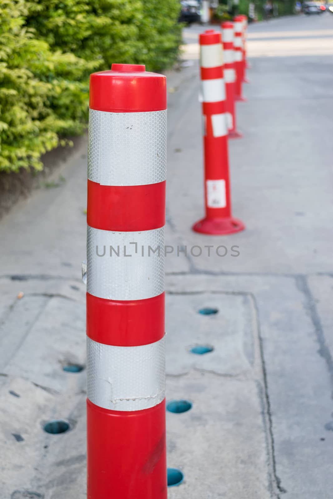 Orange cones are used to symbolize the lack of security check.