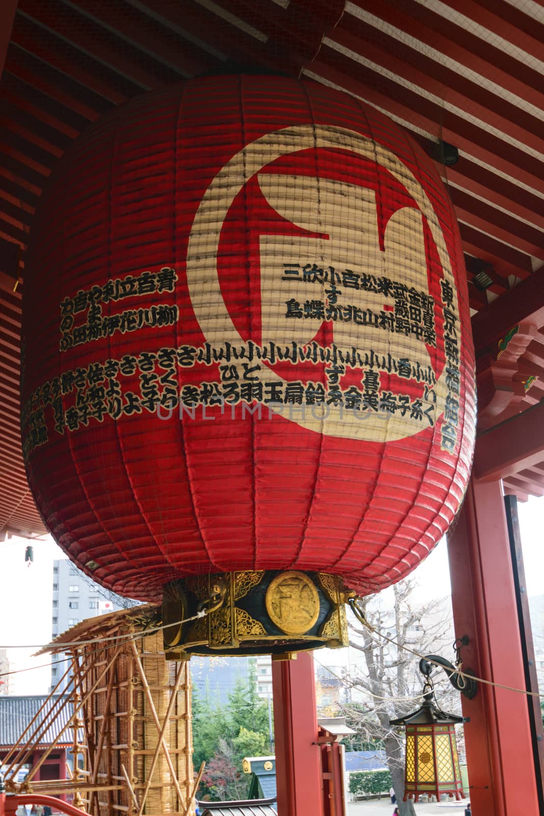 Ancient giant Japanese lantern in a beautiful Asakusa Temple in a claer day in Japan.