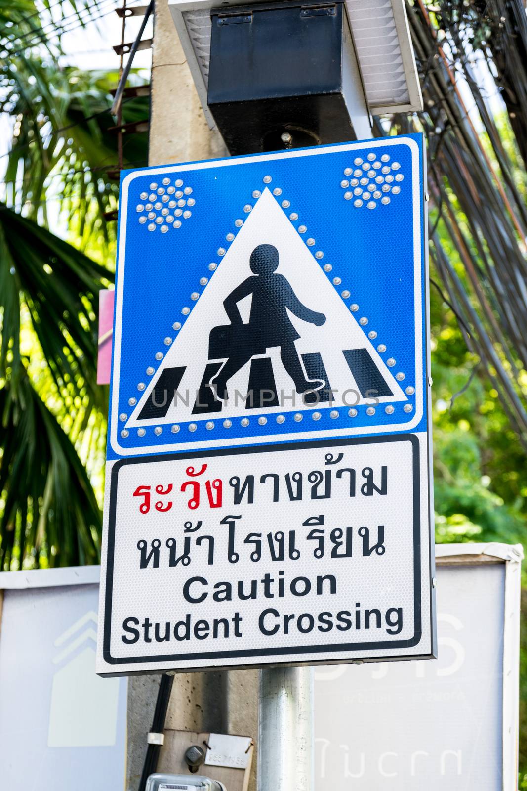 Caution student crossing signboards.