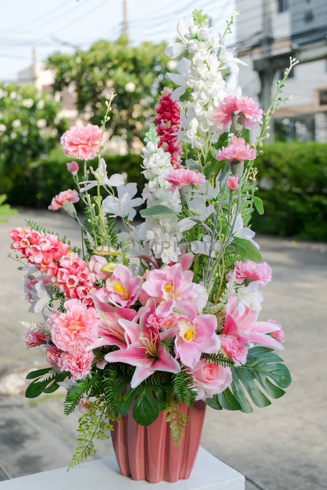 Vase plastic flowers by wattanaphob