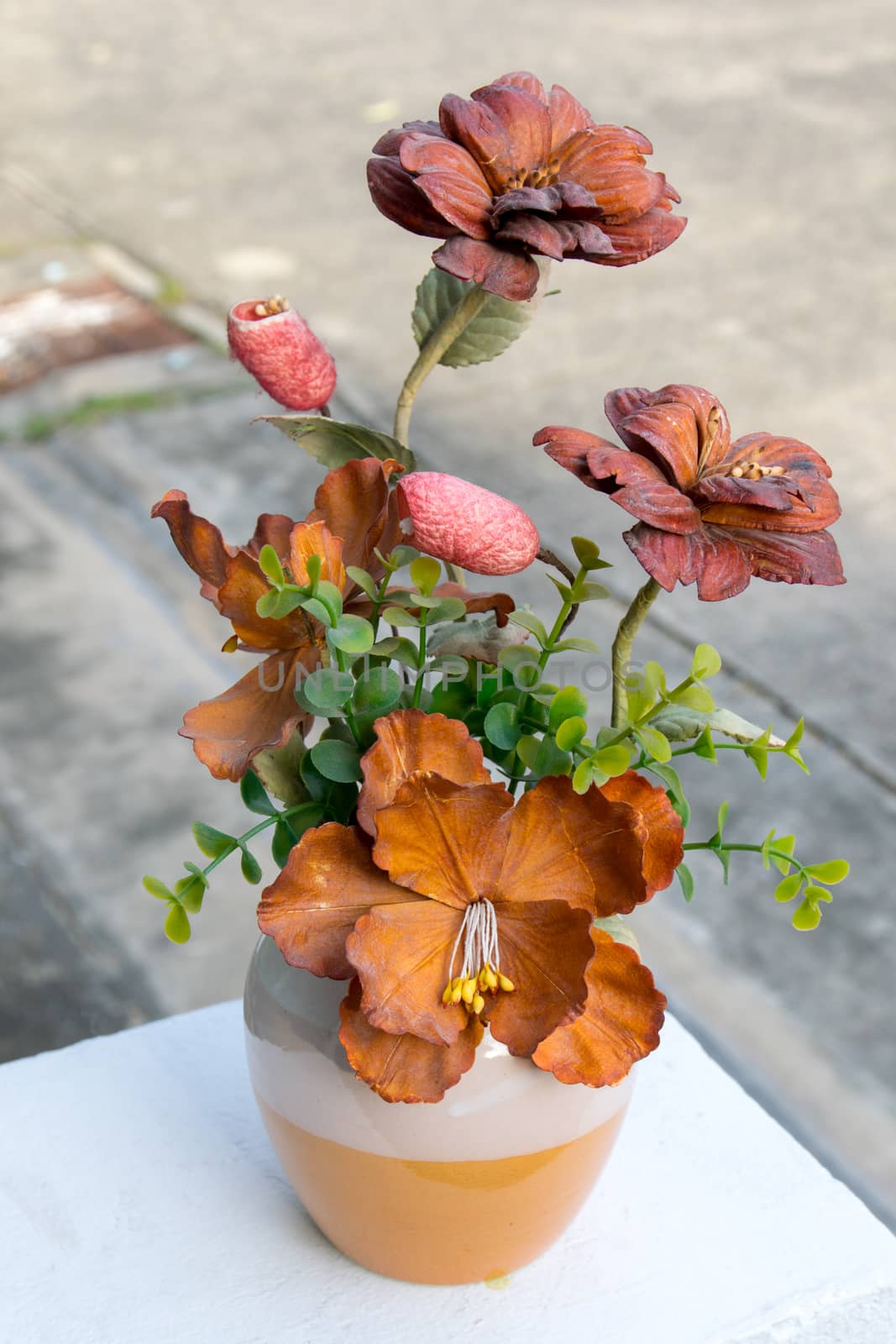 Vase plastic flowers by wattanaphob