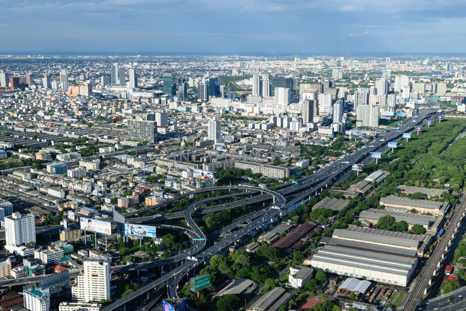 Bangkok Thailand expressway and skyline aerial view.