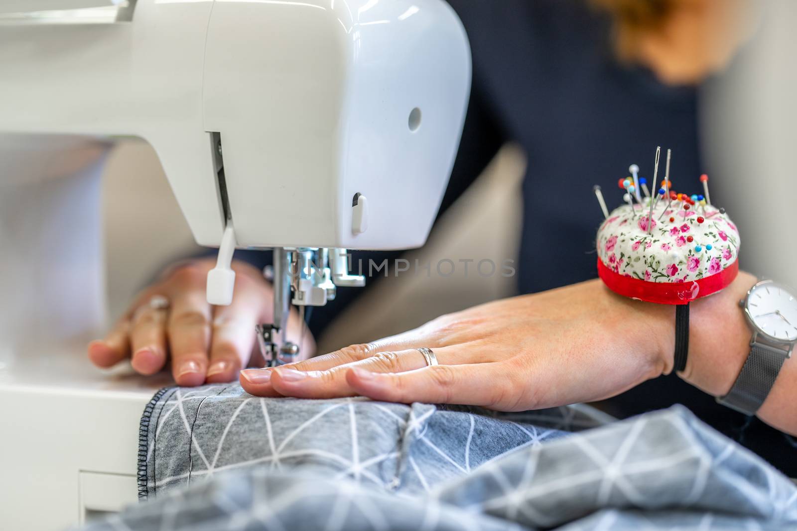 sew dressed on a sewing machine at home and in the studio by Edophoto