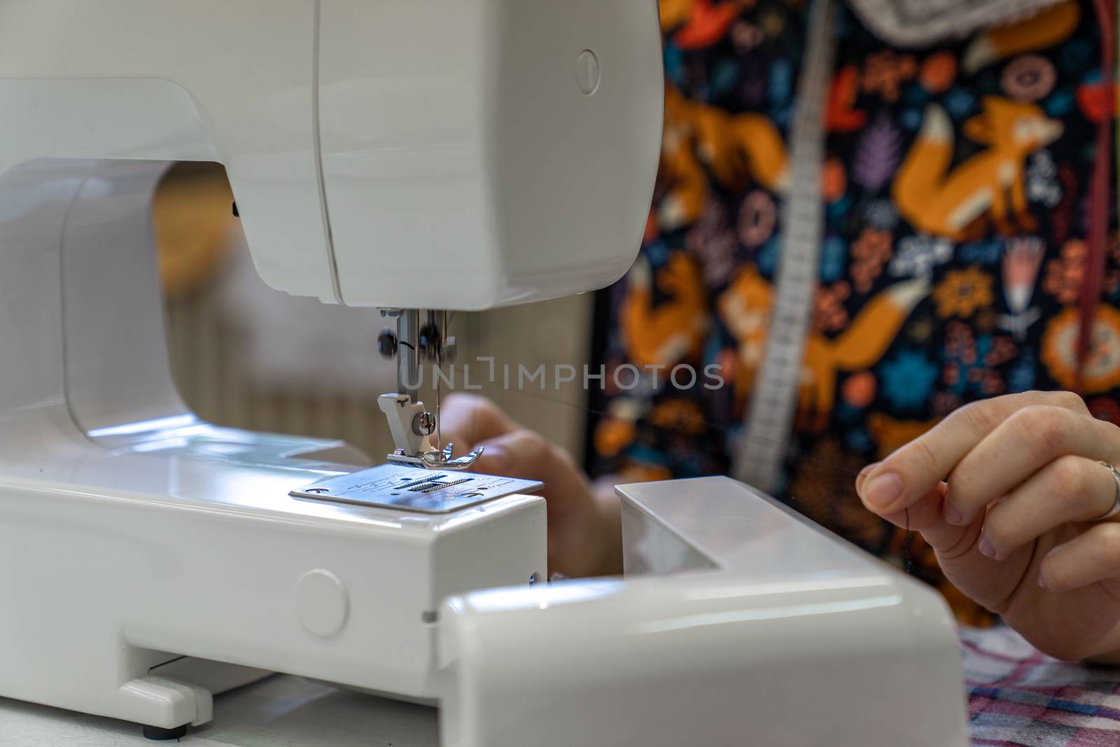 thread replacement in a sewing machine for stapling fabric.