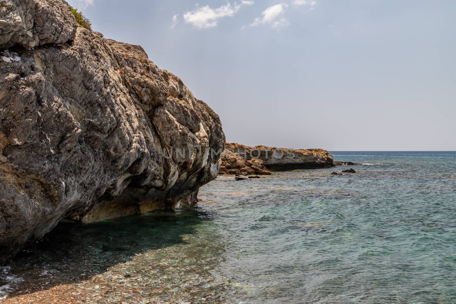 Rocks at the beach of Kiotari on Rhodes island, Greece by reinerc