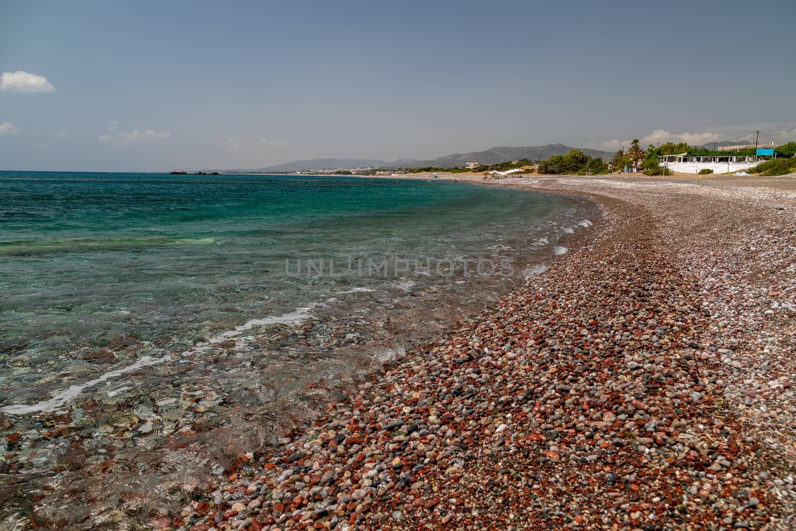 Gravel beach at Kiotari on Rhodes island, Greece by reinerc