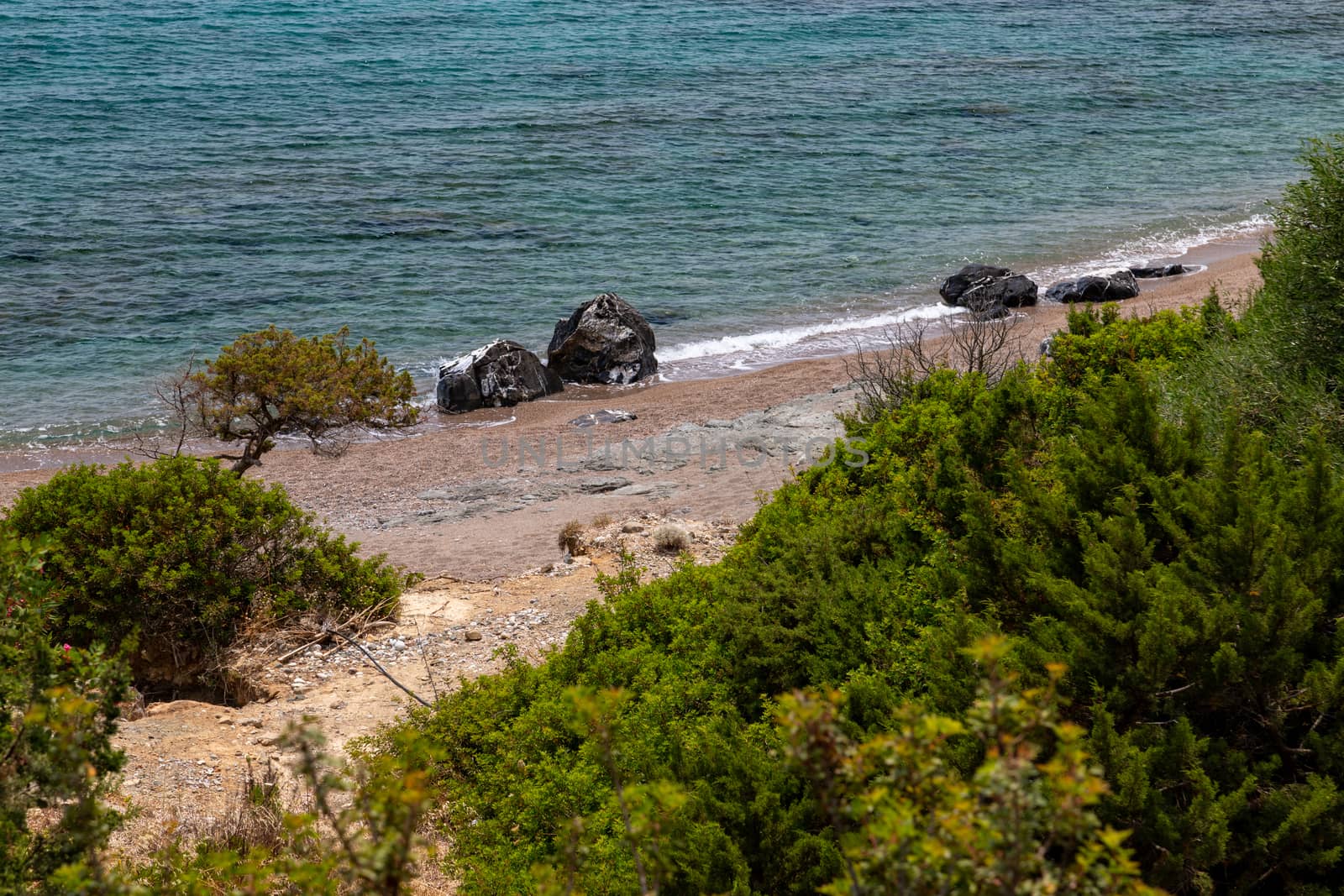 Rocks at the beach of Kiotari on Rhodes island, Greece by reinerc