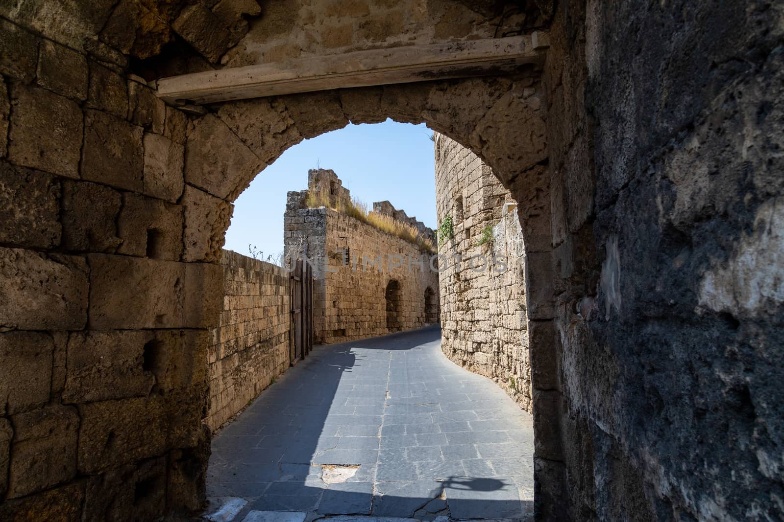 Entrance gate in the city walls of the old town of Rhodes town by reinerc