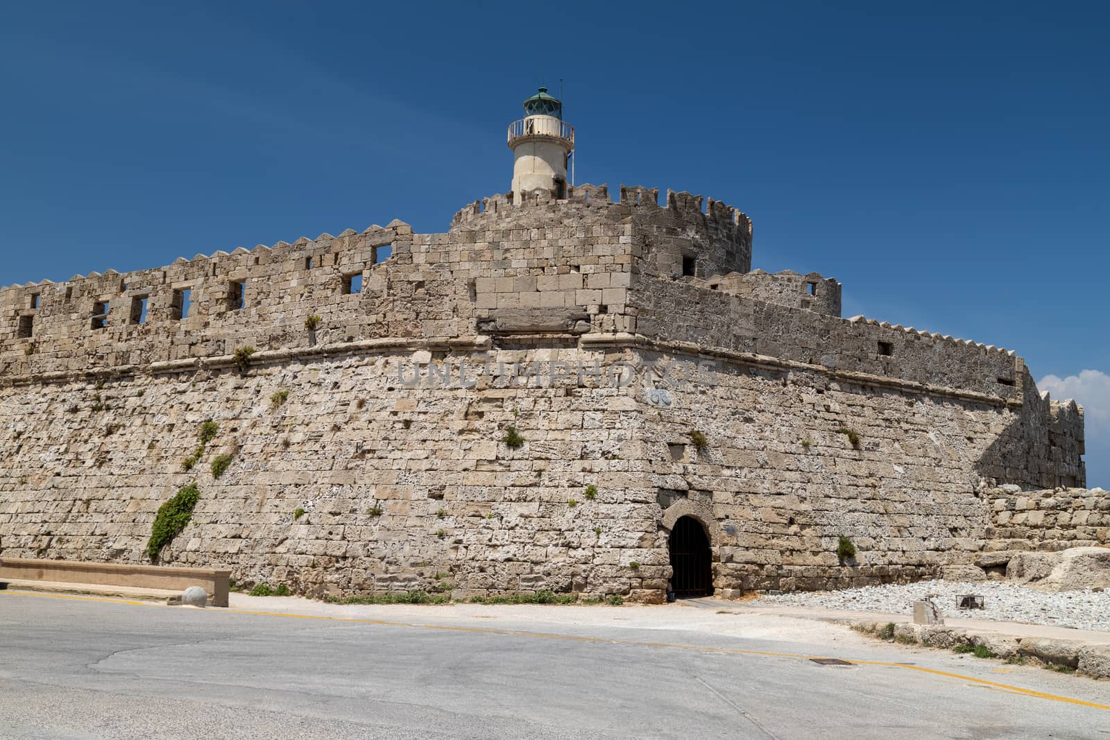 Kastell Agios Nikolaos with lighthouse at Mandraki  harbour in Rhodes city on greek island Rhodes   