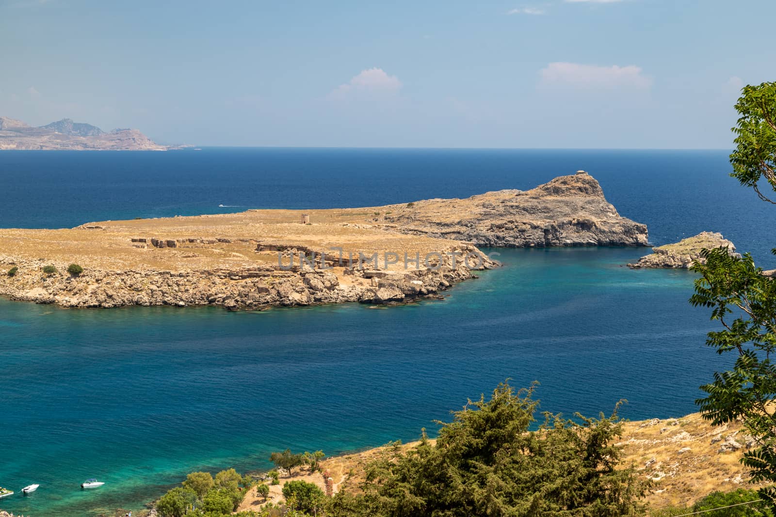 View on a beautiful bay from the acropolis of Lindos on rhodes island in greece