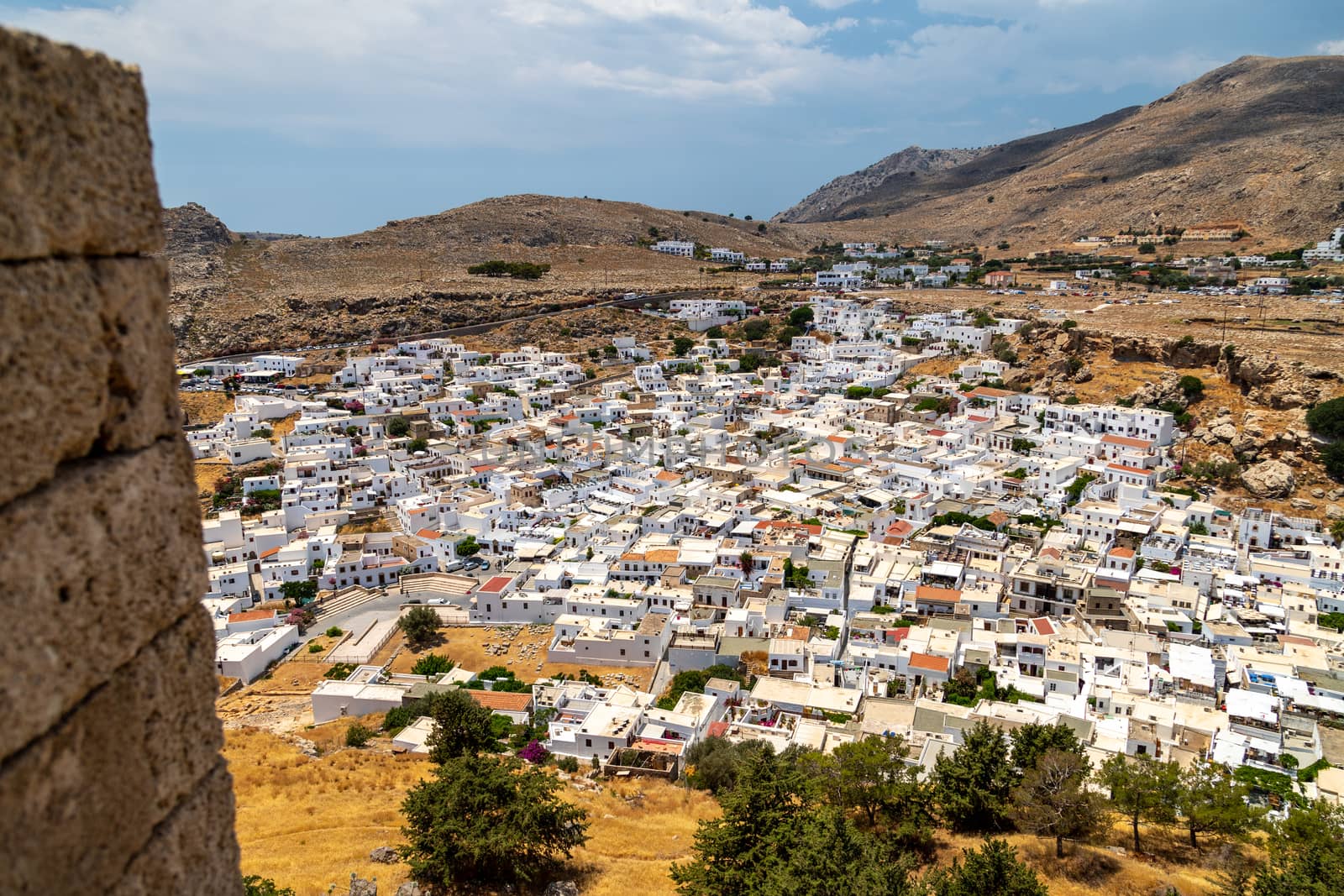 View at the city of Lindos on Greek island Rhodes with white hou by reinerc