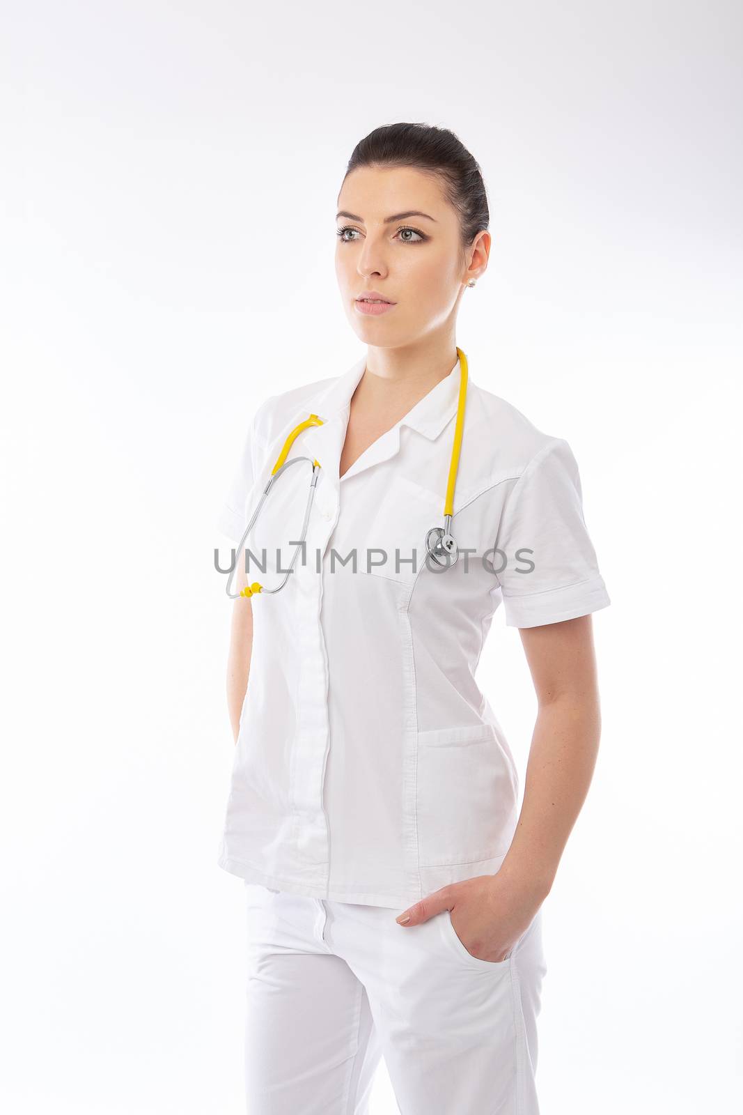 brunette doctor in white wearing and stethoscope