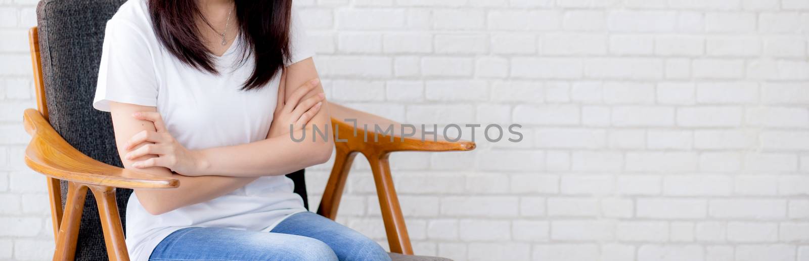 Banner website beautiful young asian woman happiness sitting on chair on gray cement texture grunge wall brick background, businesswoman is a smiling on concrete, business people concept.