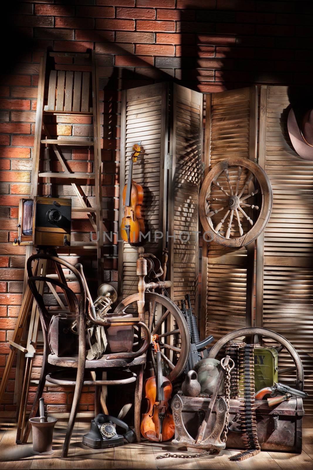 Still life with old ladder, violins and wooden ladder