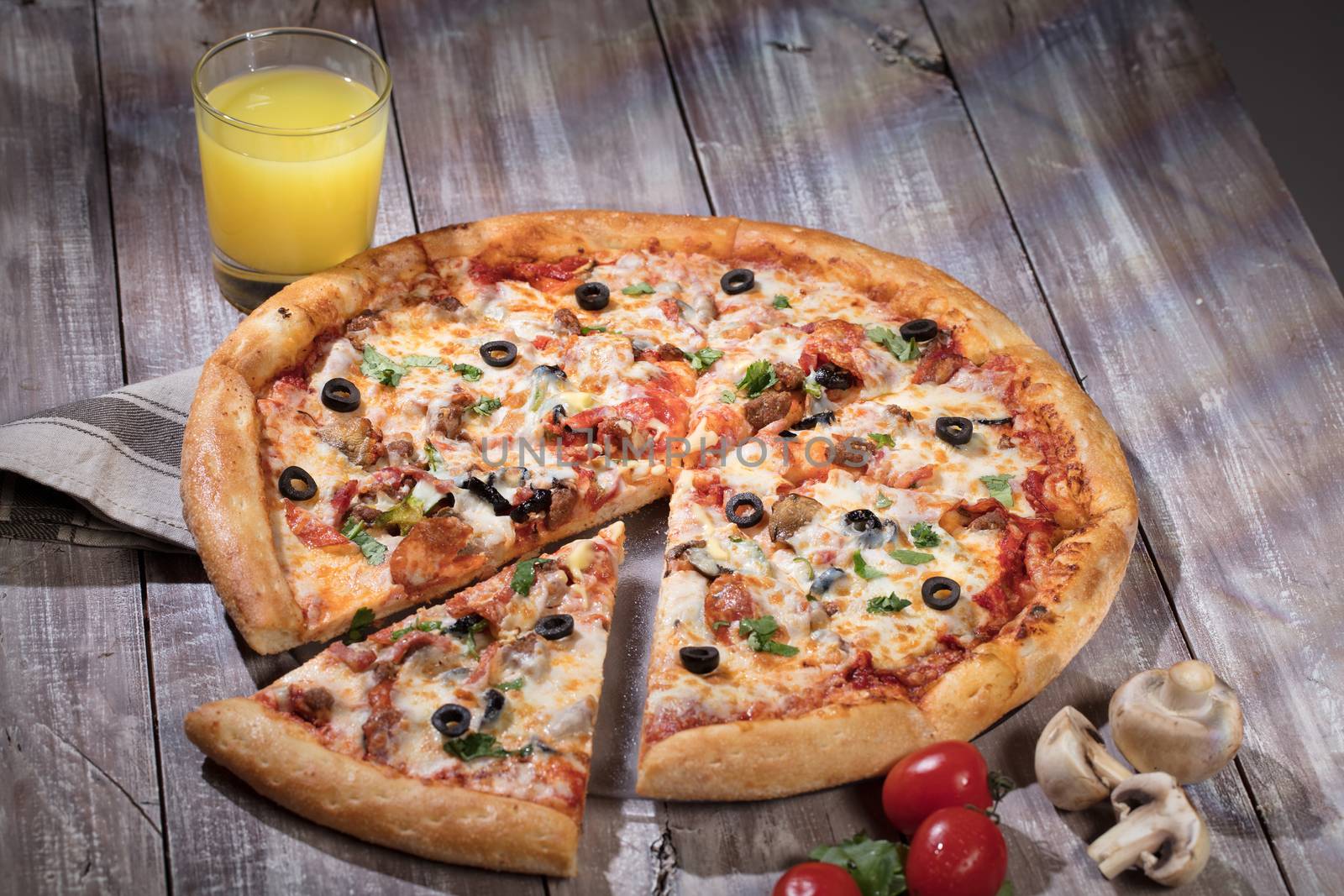 Pizza on an old wooden table