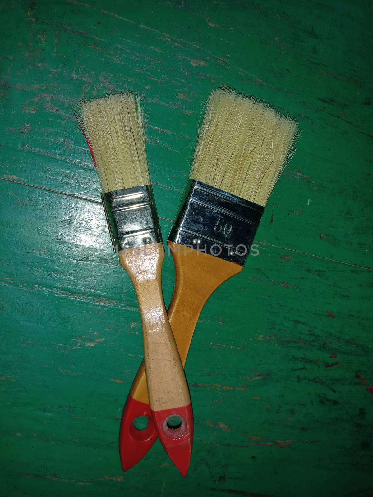 paint brush on green background for painting