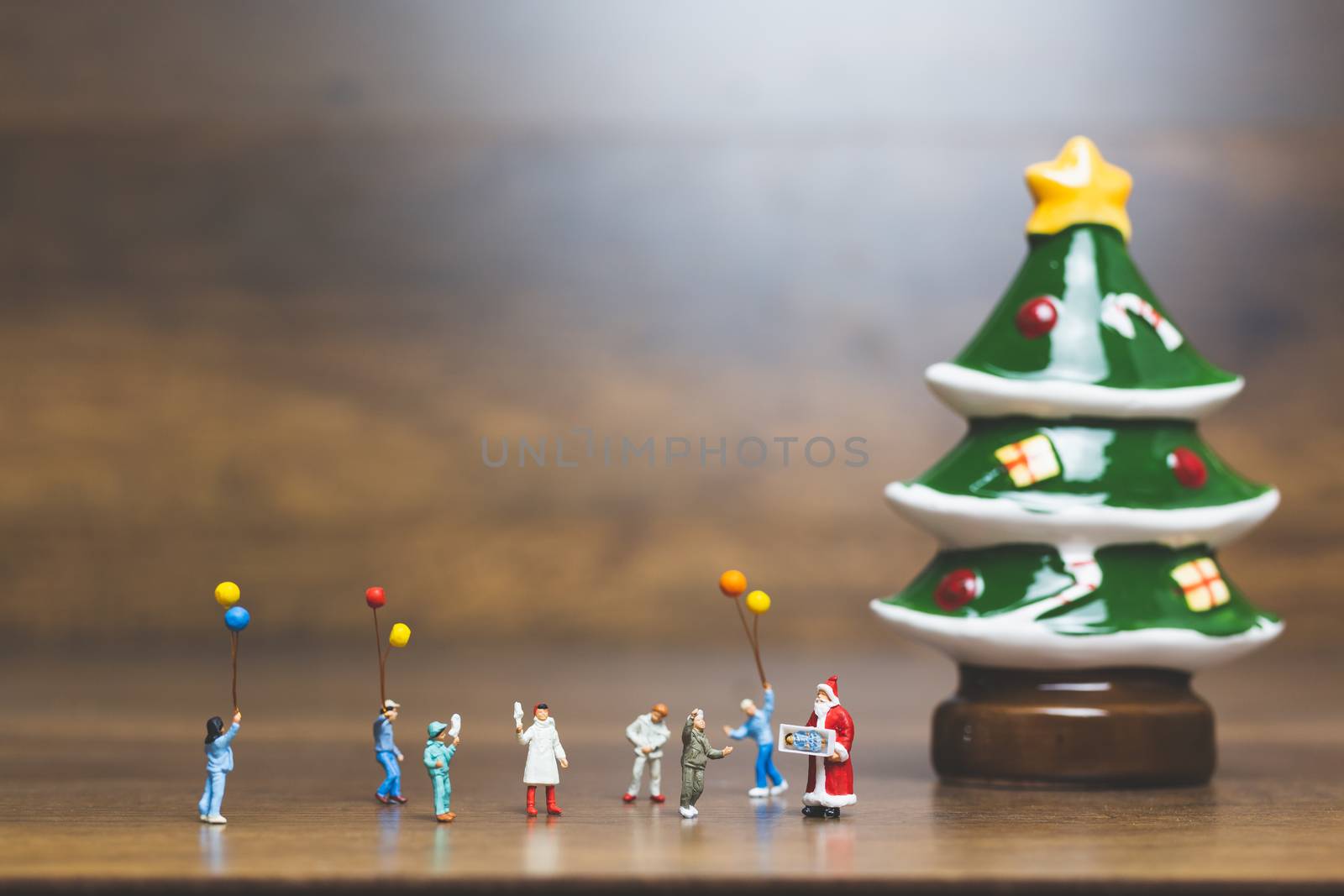 Miniature people, Happy family celebrating A Christmas  , Christmas and Happy New Year concept.