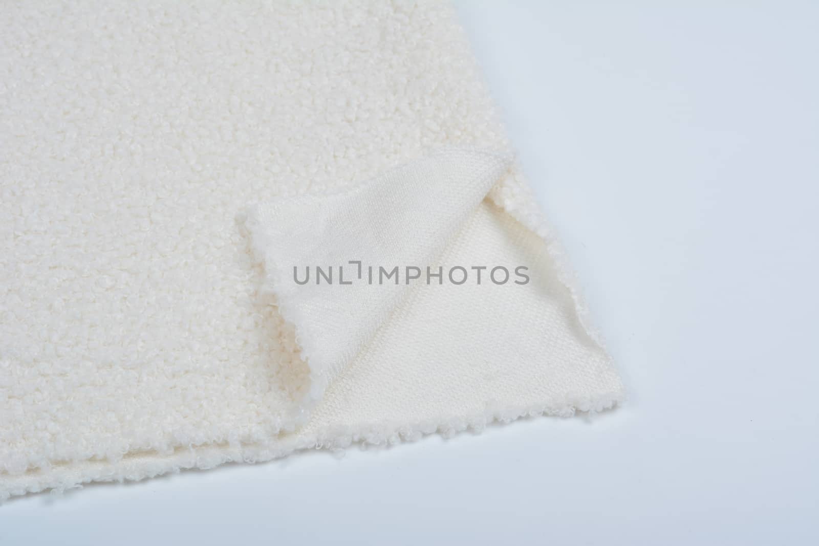 Abstract Artificial texture fur fabric, background, closeup. Fluffy material backdrop, kids toys faux fur.