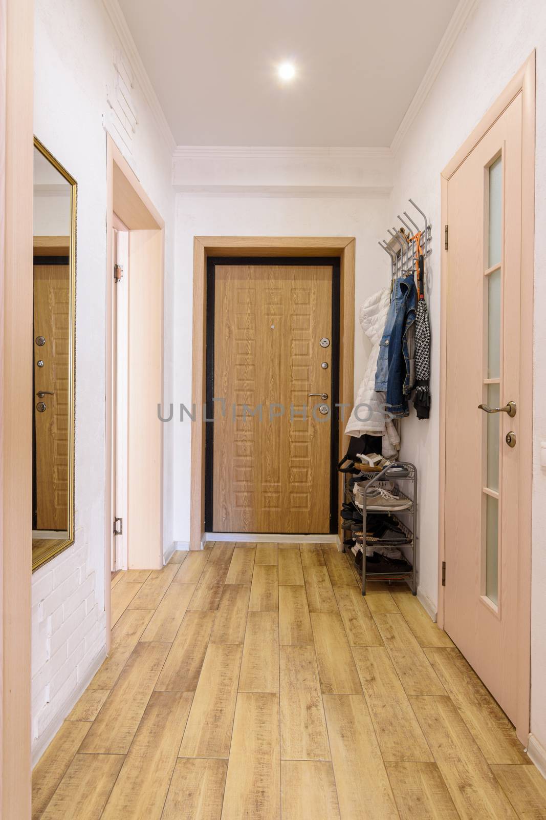 Corridor interior in a small one-room apartment in an apartment building