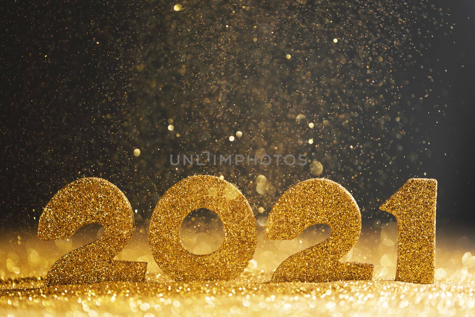 Happy new year 2021 celebration, glitter numbers on blue background