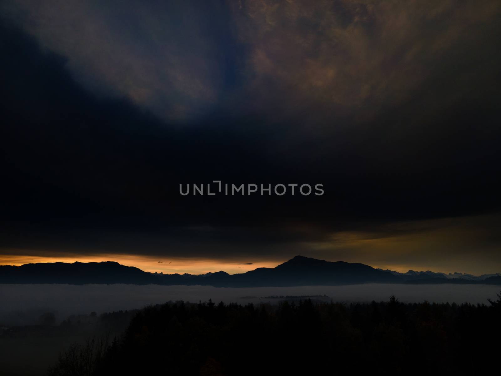 Panoramic foggy landscape with mountains in morning. Landscape by PeterHofstetter
