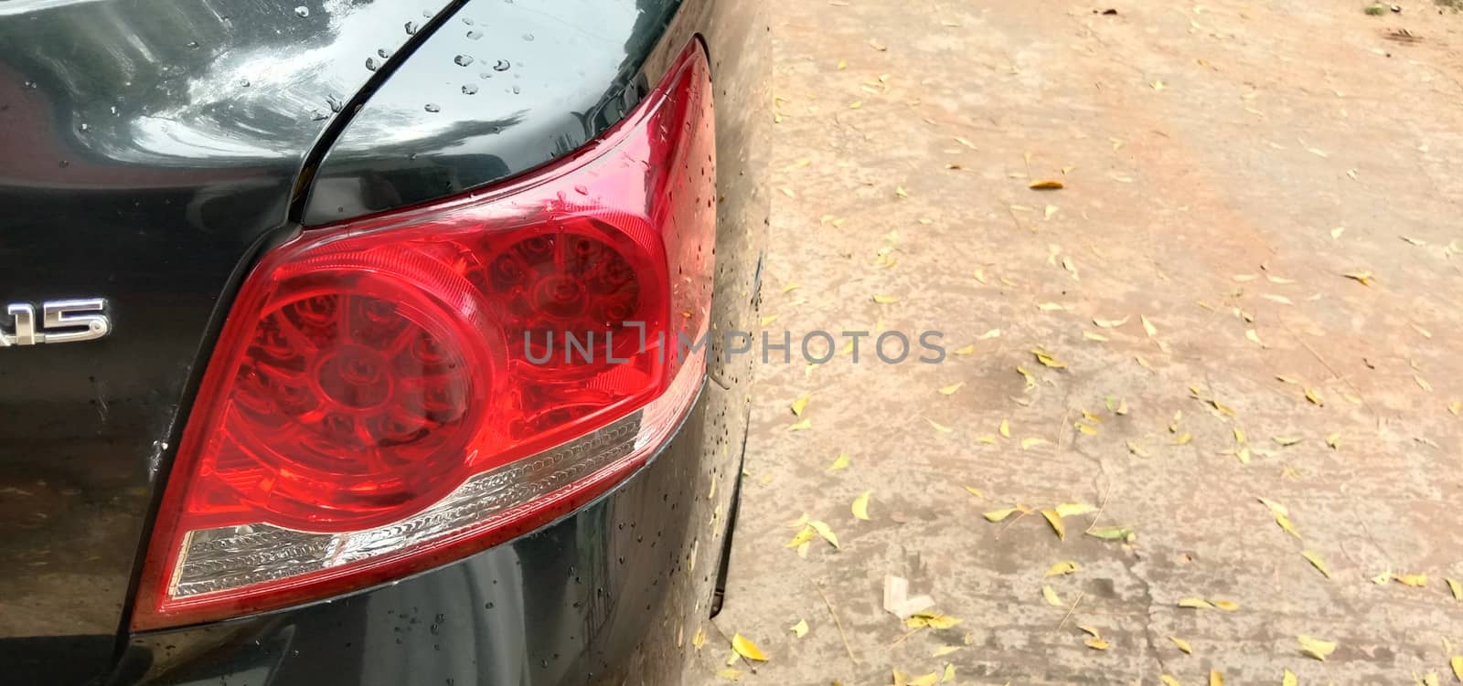 back light of black colored car on road