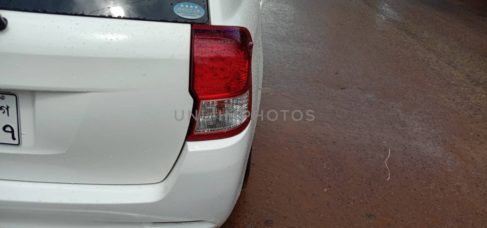 back side of white colored car by jahidul2358