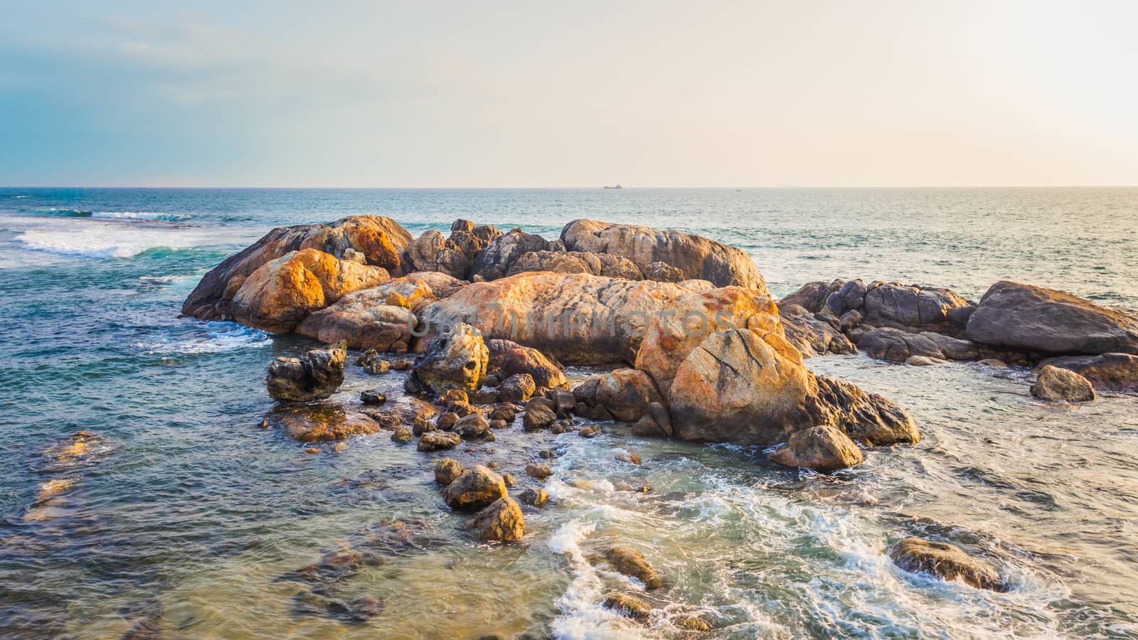 Rock formations in galle fort beach by nilanka