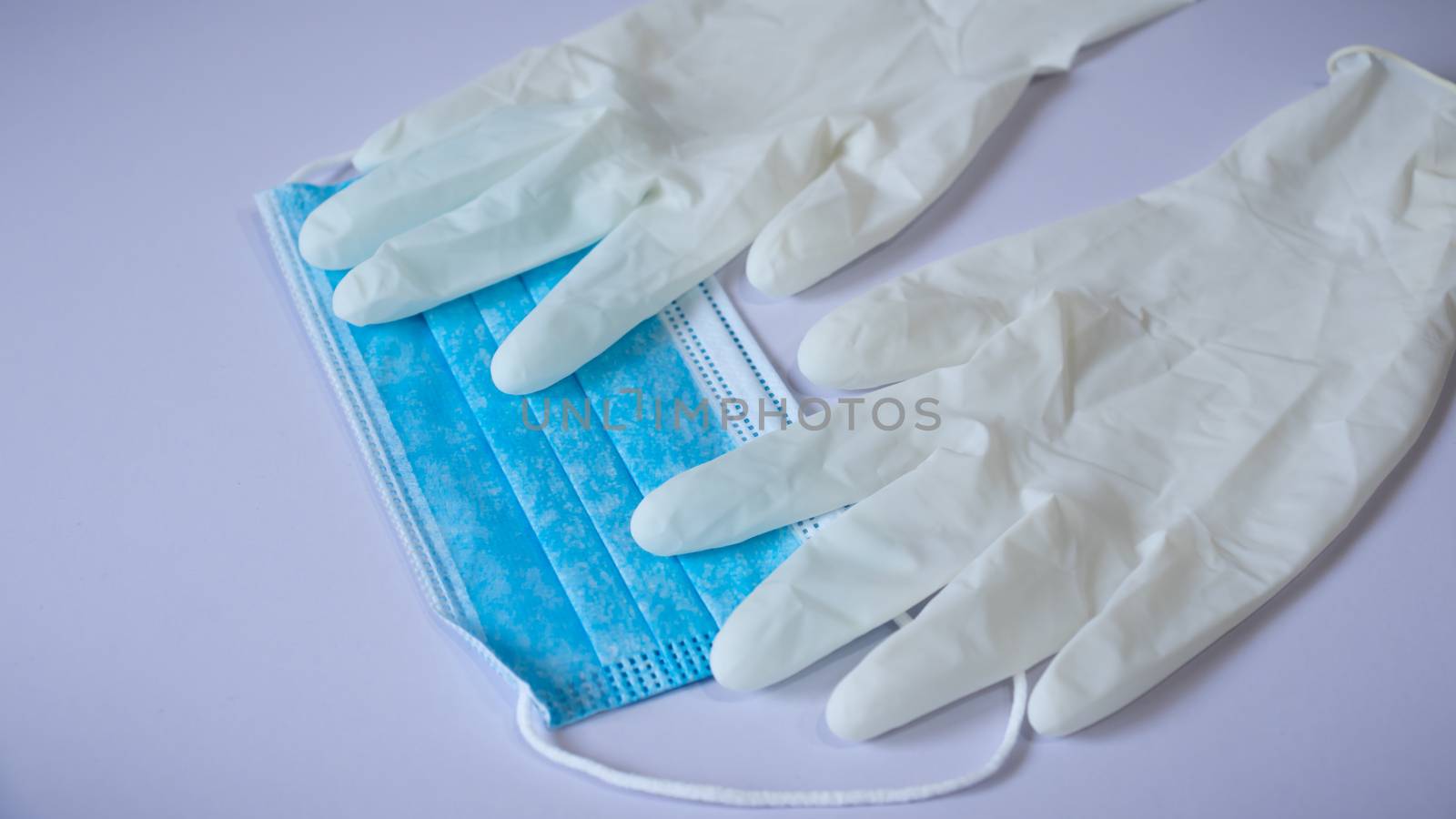 Medical face mask and pair of latex medical gloves