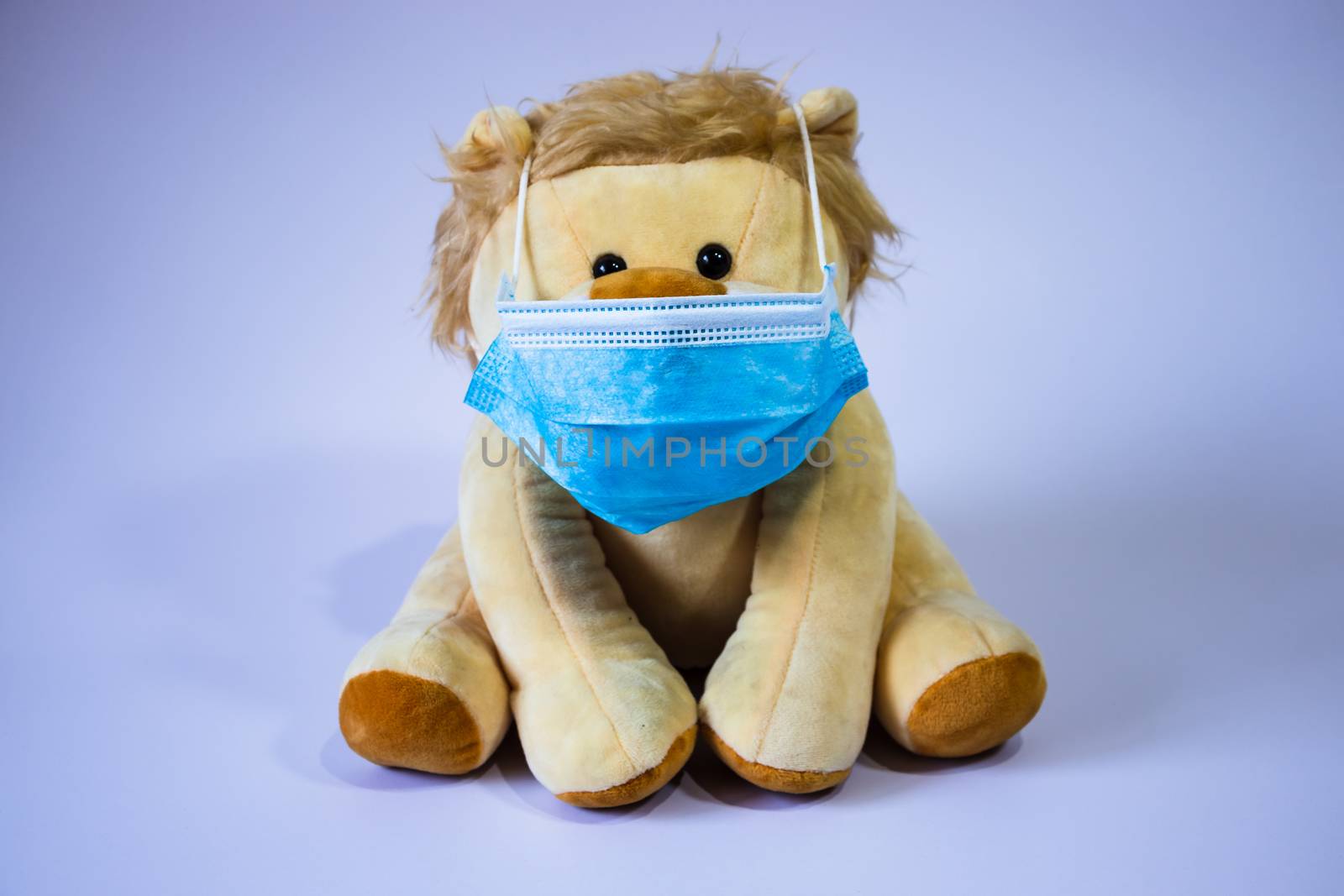 Protective medical face mask wearing stuffed lion toy by nilanka