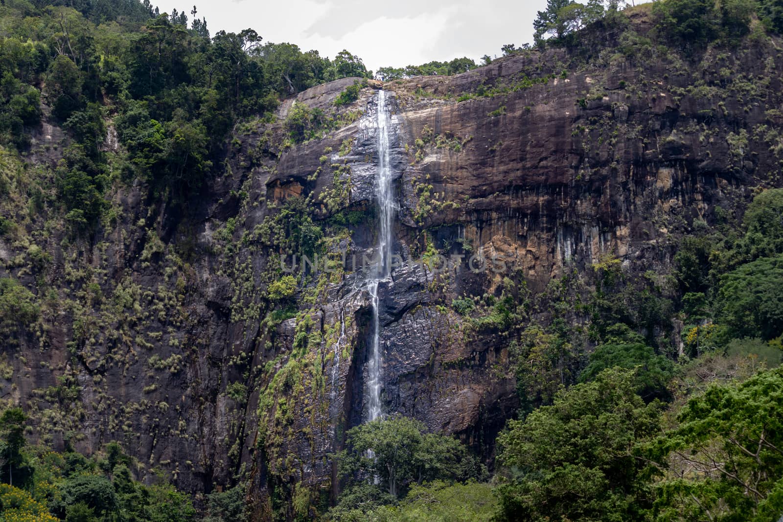 Diyaluma falls almost dried out, dry season in koslanda, from a long-distance photograph. by nilanka