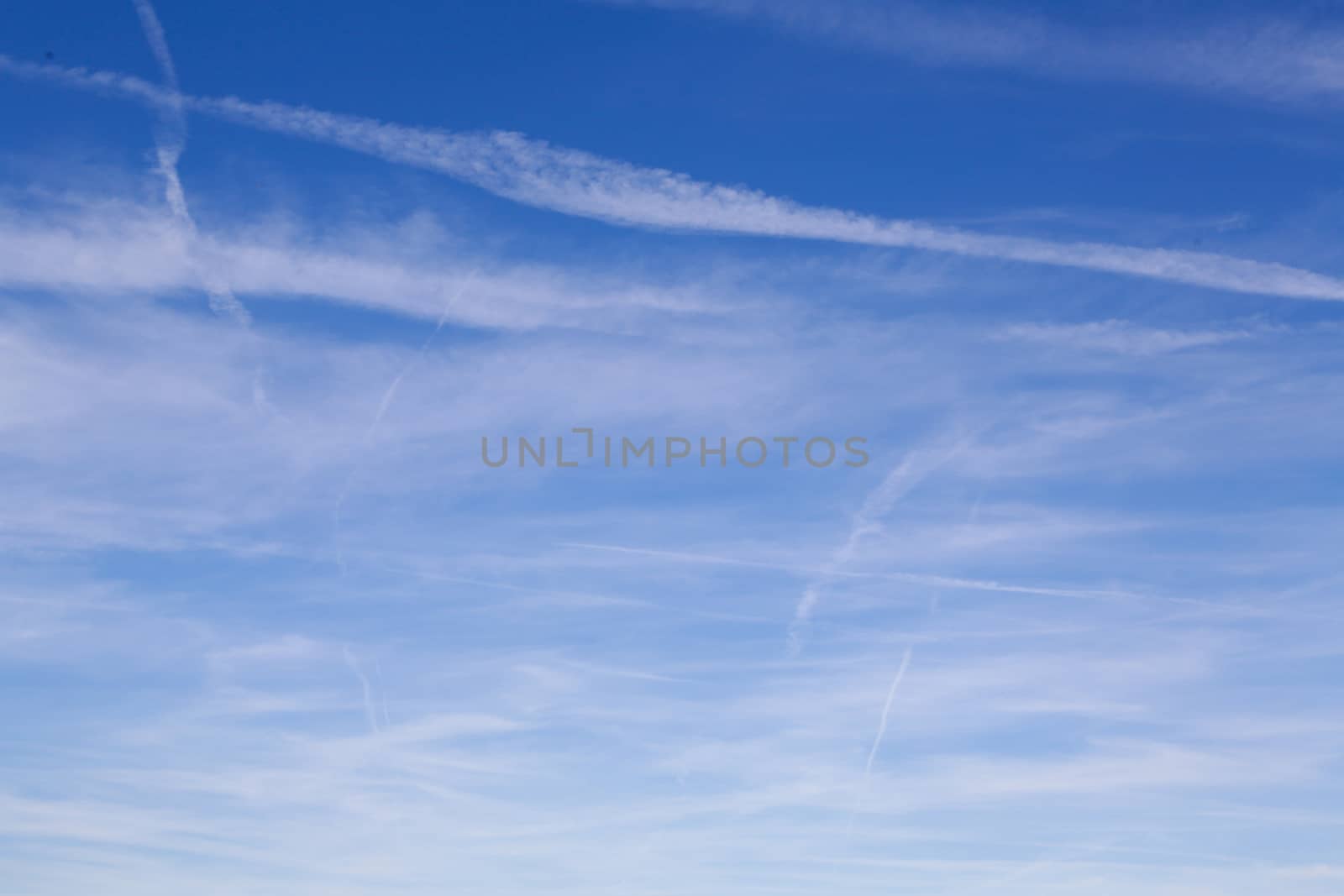 White clouds and stripes in the blue sky