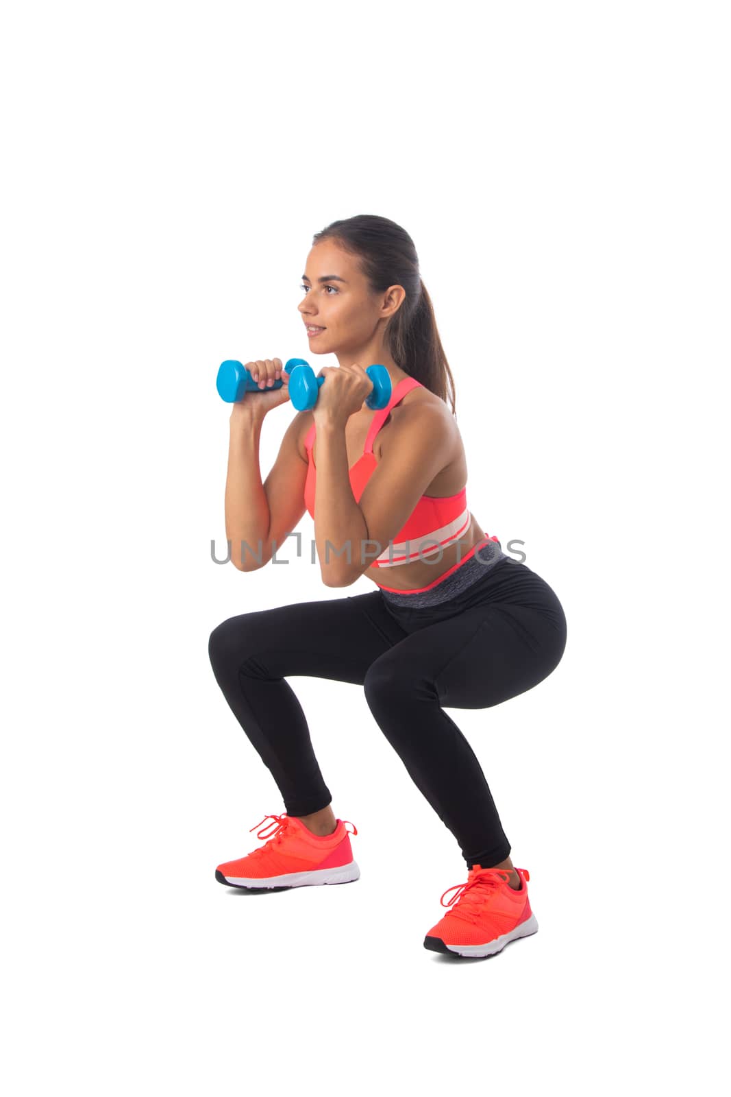 Healthy hispanic fitness girl with doing workout squat exercise isolated on white background