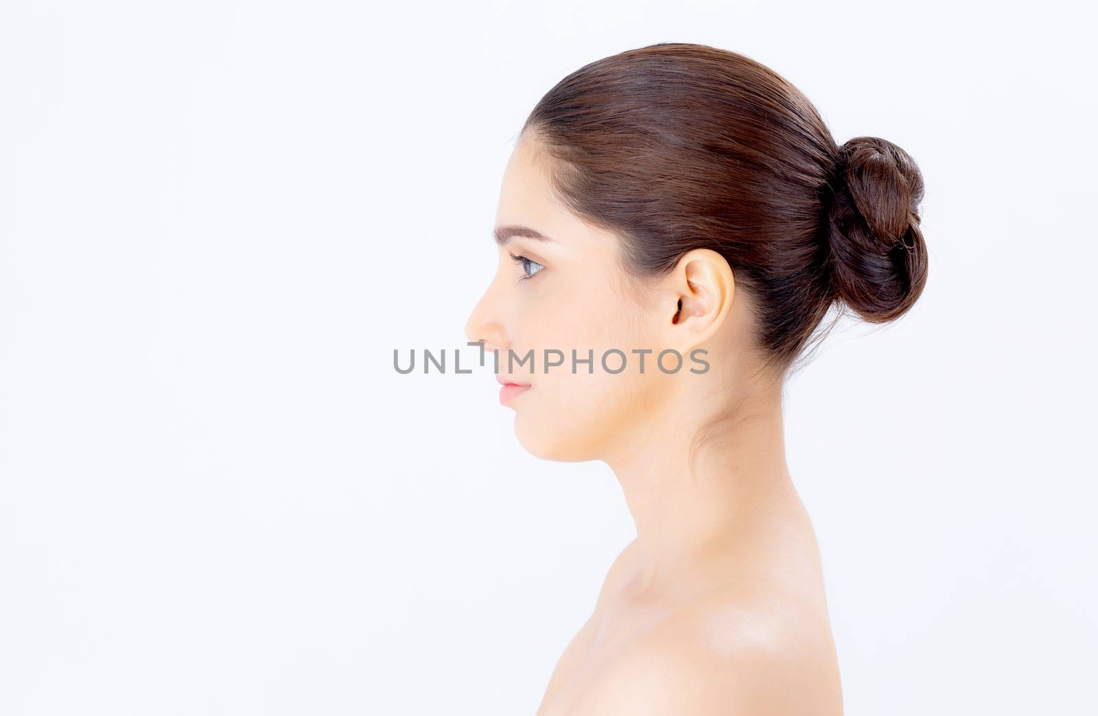 Portrait beside of beautiful asian woman makeup of cosmetic, girl smile attractive, face of beauty perfect with wellness isolated on white background with skin healthcare concept.