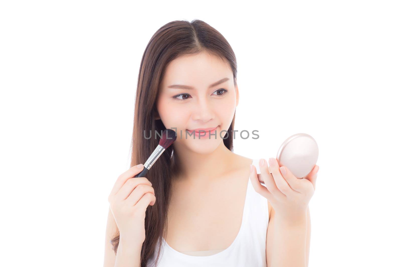 Beauty of portrait asian woman applying make up with brush of cheek isolated on white background, beautiful of girl holding blusher, skincare and cosmetic concept.