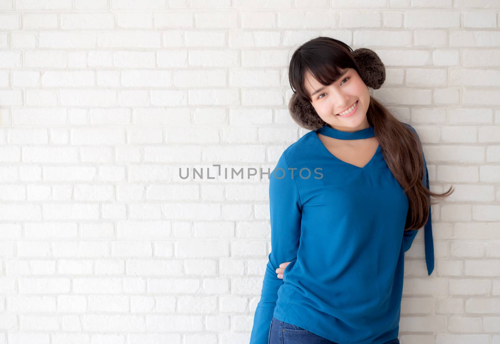 Portrait of beautiful young asian woman enjoy and happiness stan by nnudoo