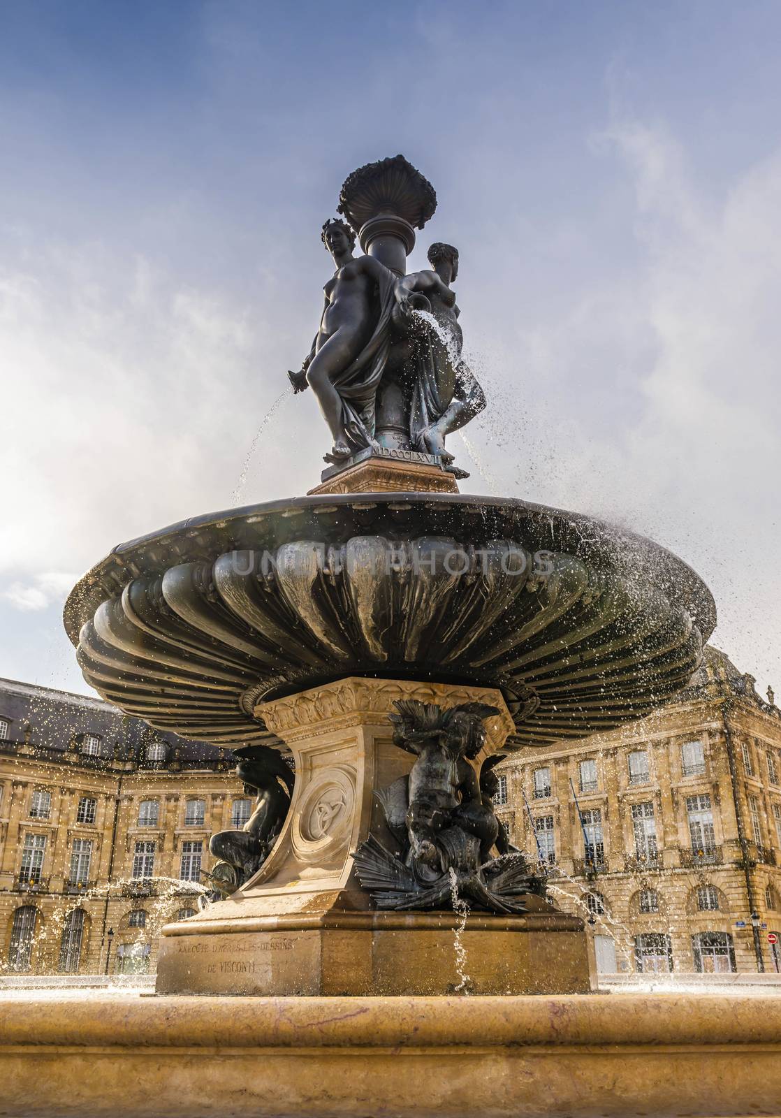 Fountain of the Three Graces on the Place de la Bourse in Bordeaux in Gironde, Nouvelle-Aquitaine, in the south-west of France. by Frederic
