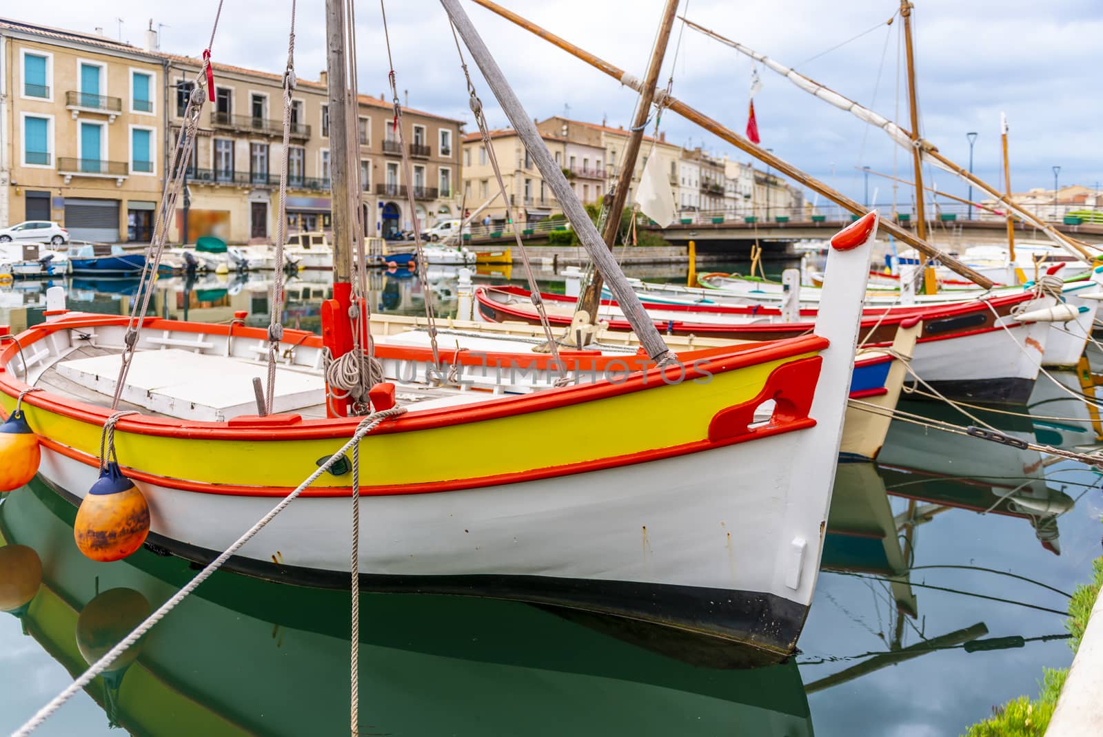 Small typical Languedoc sailboats, on the canals in Sète. In the south of France. by Frederic