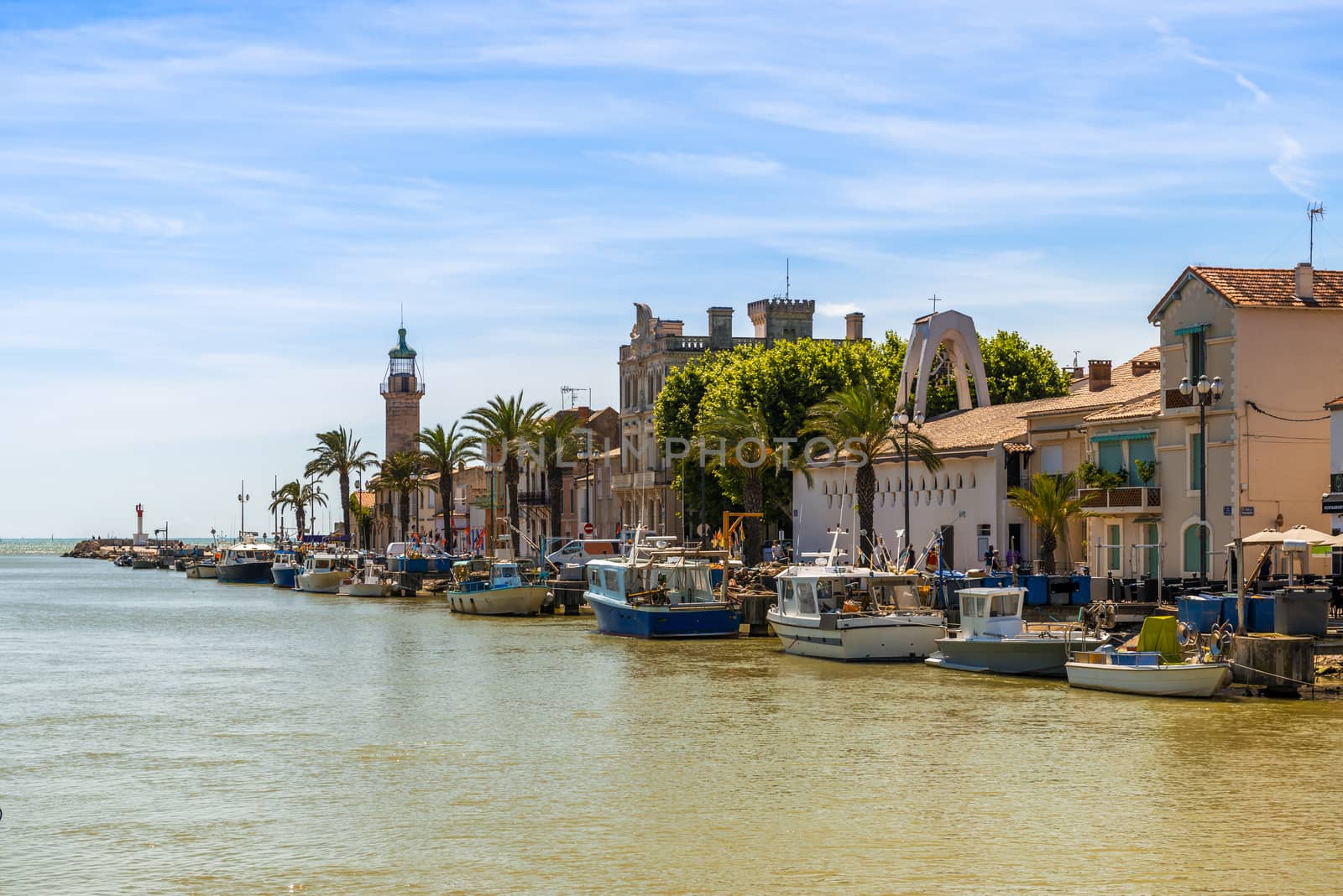 Panorama of Grau du Roi and the Canal Saint-Louis flowing into the Mediterranean, in the Gard in Occitanie, France. by Frederic