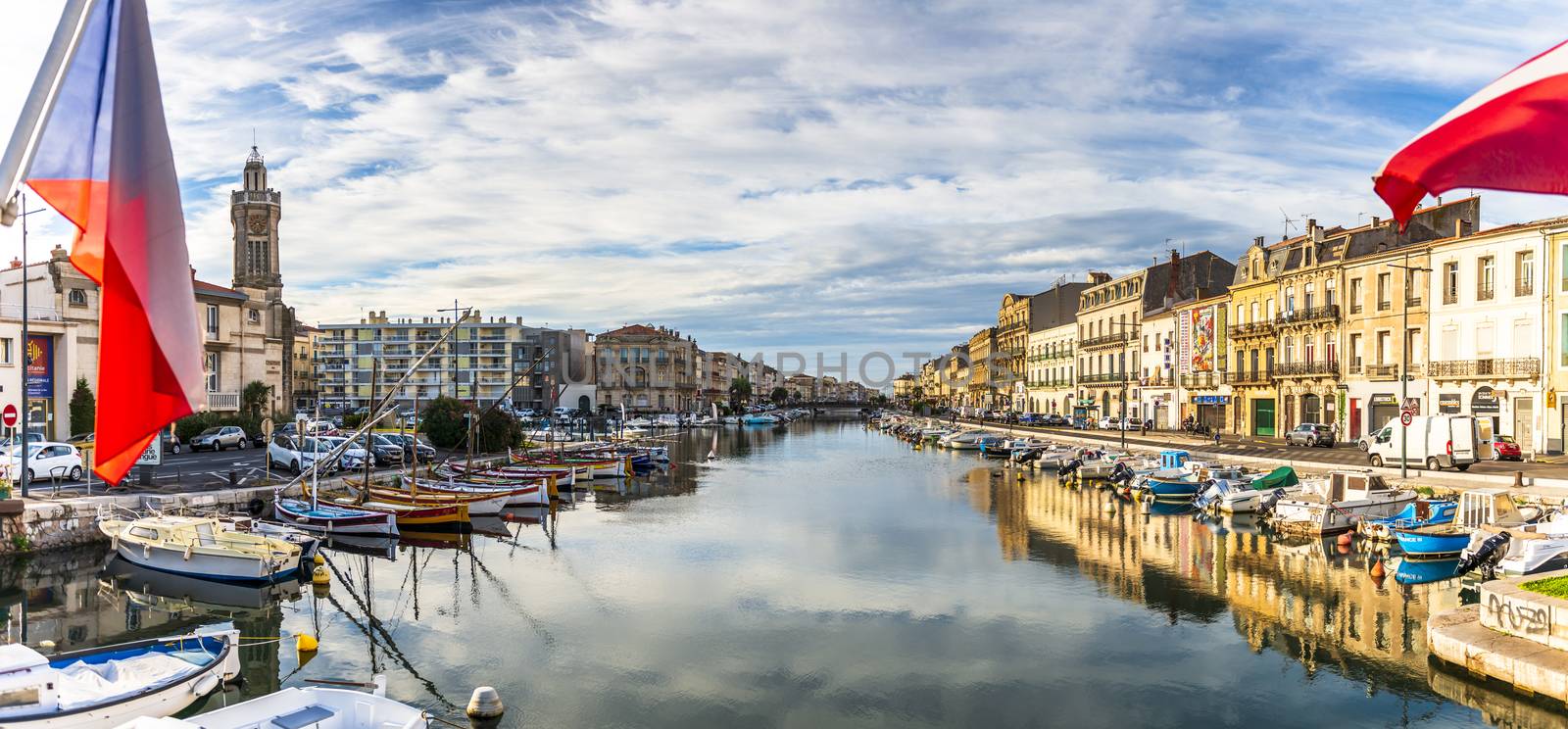 Panoramic view of the Sète canal in the morning in summer, in Hérault in Occitania, France by Frederic