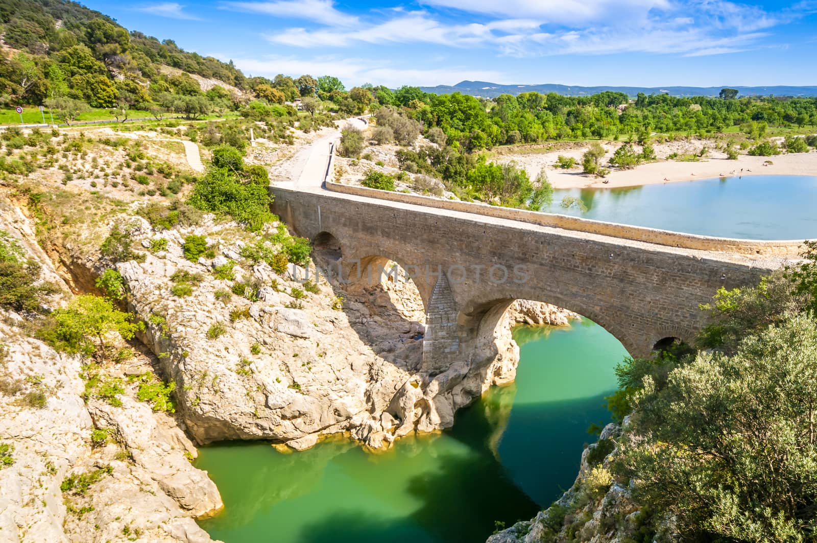 Devil`s Bridge over the Hérault in Occitanie, France. by Frederic
