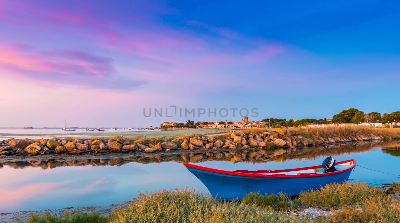 Superb sunrise under a very colorful sky in shades of mauve on the Thau lagoon near Mèze. by Frederic