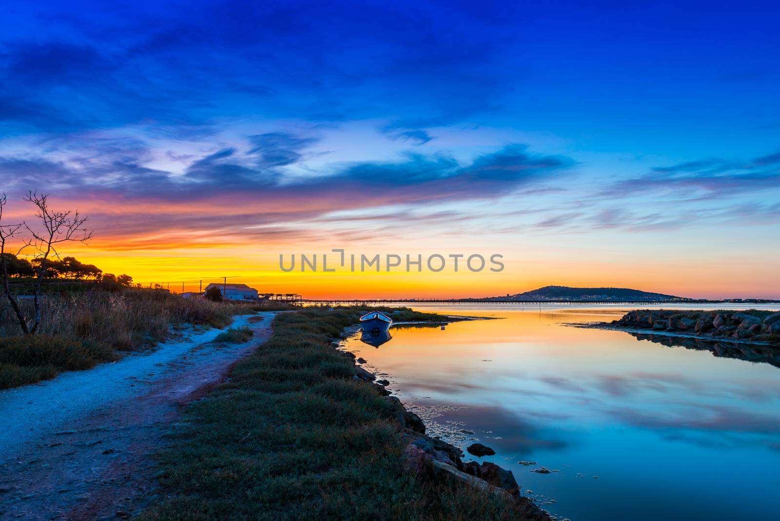 Panorama of the Etang de Thau à Meze at dusk, in Herault in Occitanie, France. by Frederic